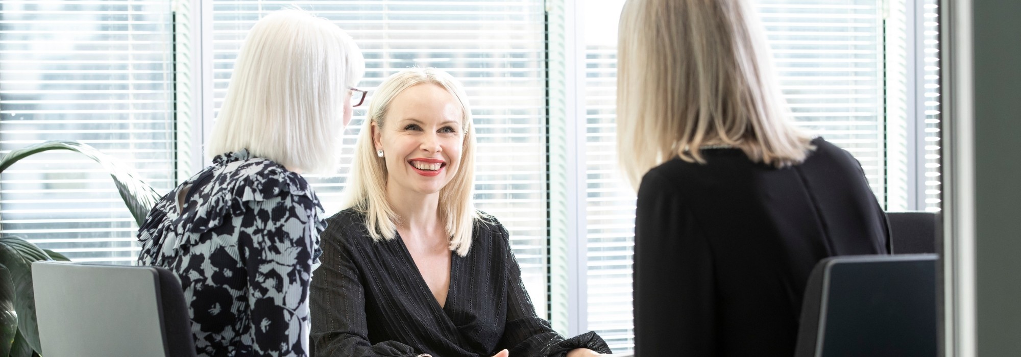 Recruitment Manager smiling in meeting